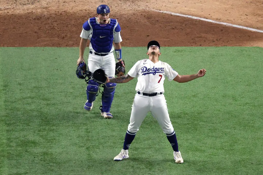 Julio Urias of the Los Angeles Dodgers celebrates after closing out