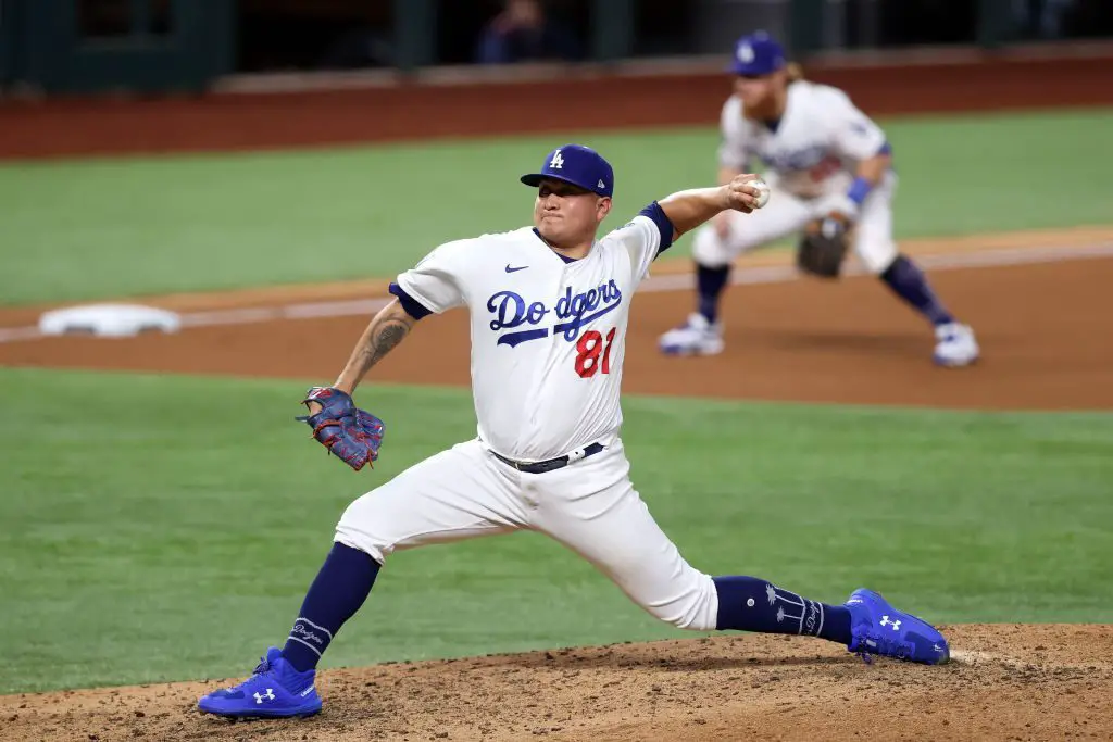 Los Angeles, United States. 10th July, 2020. Pitcher Victor Gonzalez winds  up to deliver during an intrasquad game in preparation for the shortened  MLB season at Dodger Stadium in Los Angeles on