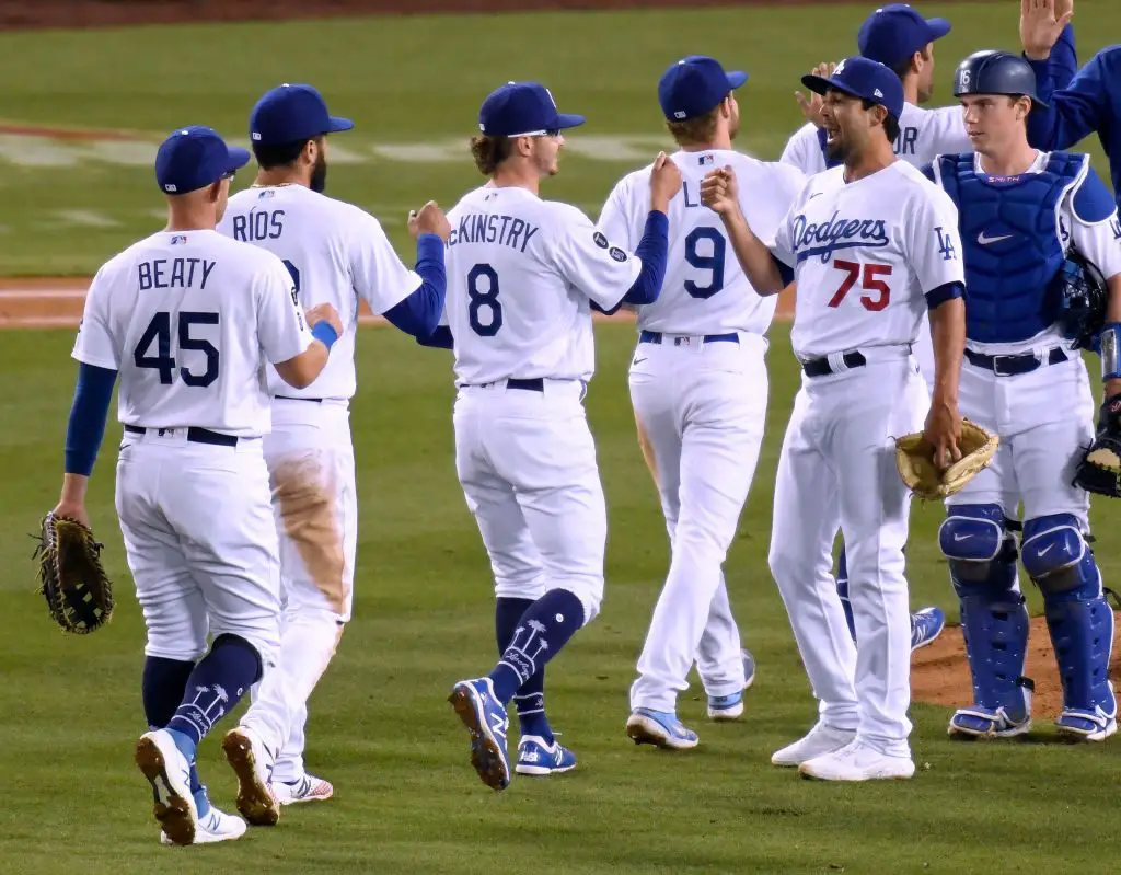 Los Angeles Dodgers Matt Beaty (45) celebrates with Zach McKinstry