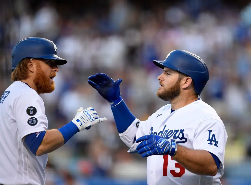 Dodgers infielder Max Muncy and his wife Kellie, left, with their