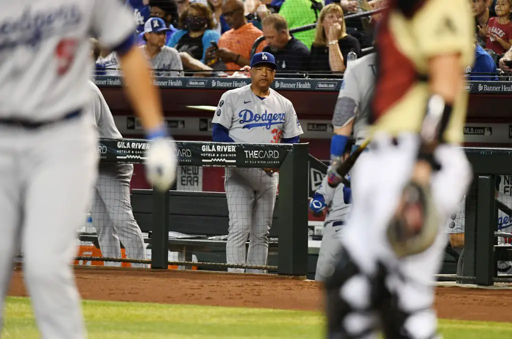 Los Angeles Dodgers manager Dave Roberts (30) looks on before the