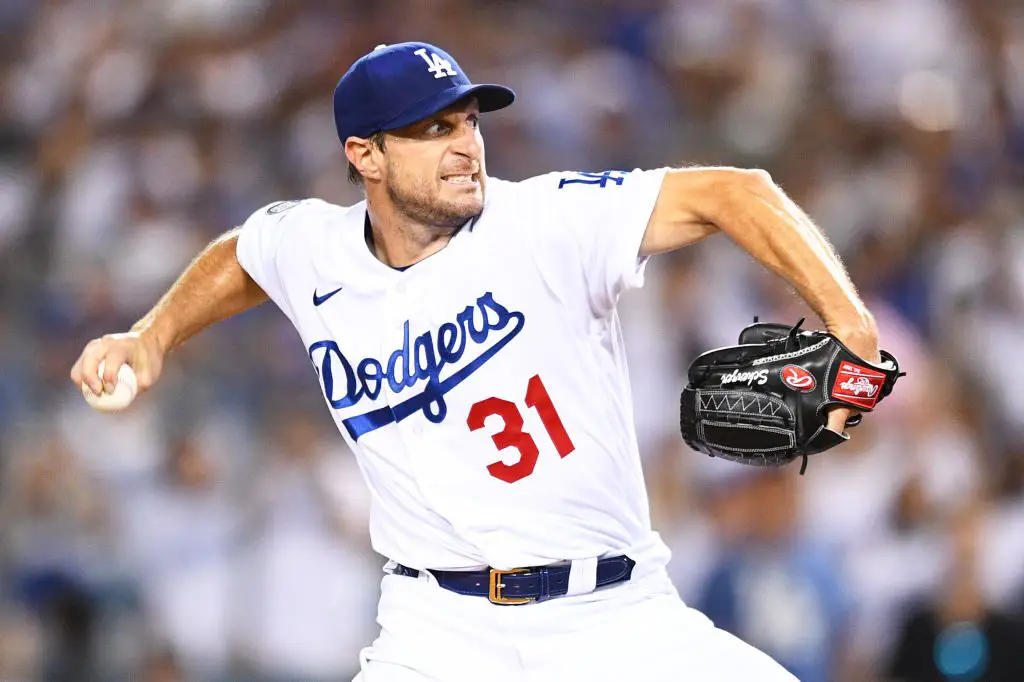 Los Angeles Dodgers pitcher Max Scherzer (31) pitches the ball