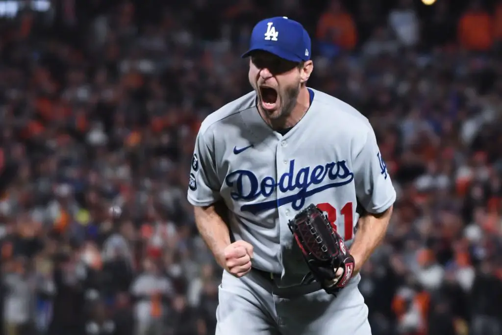 Max Scherzer of the New York Mets reacts after getting out of the News  Photo - Getty Images