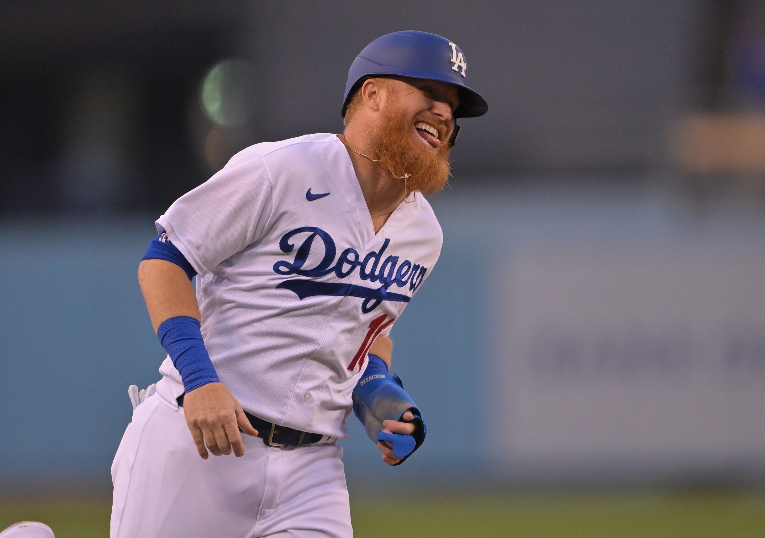 Los Angeles Dodgers' Justin Turner (21) stands at first base