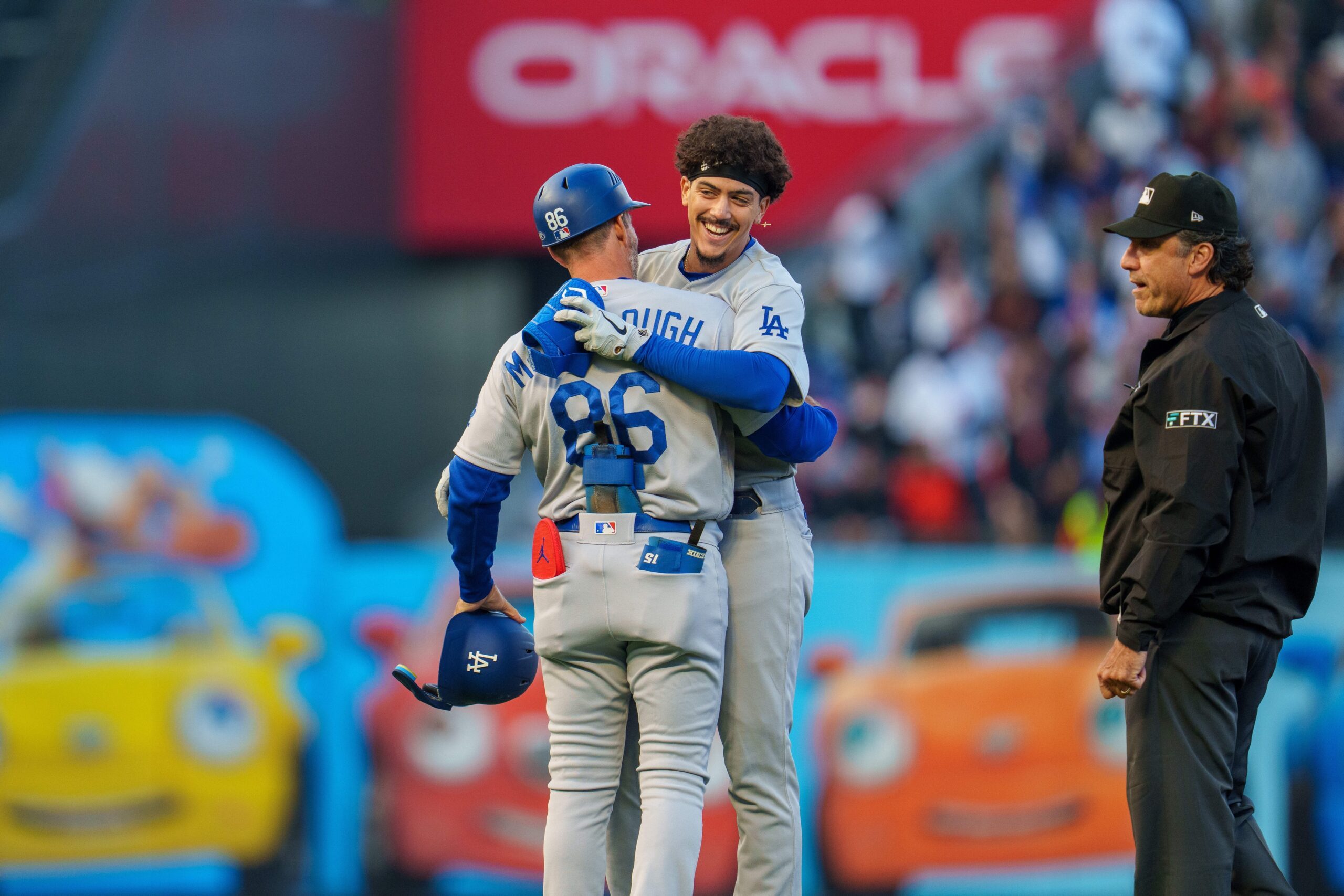 James Outman of the Los Angeles Dodgers is congratulated by Cody