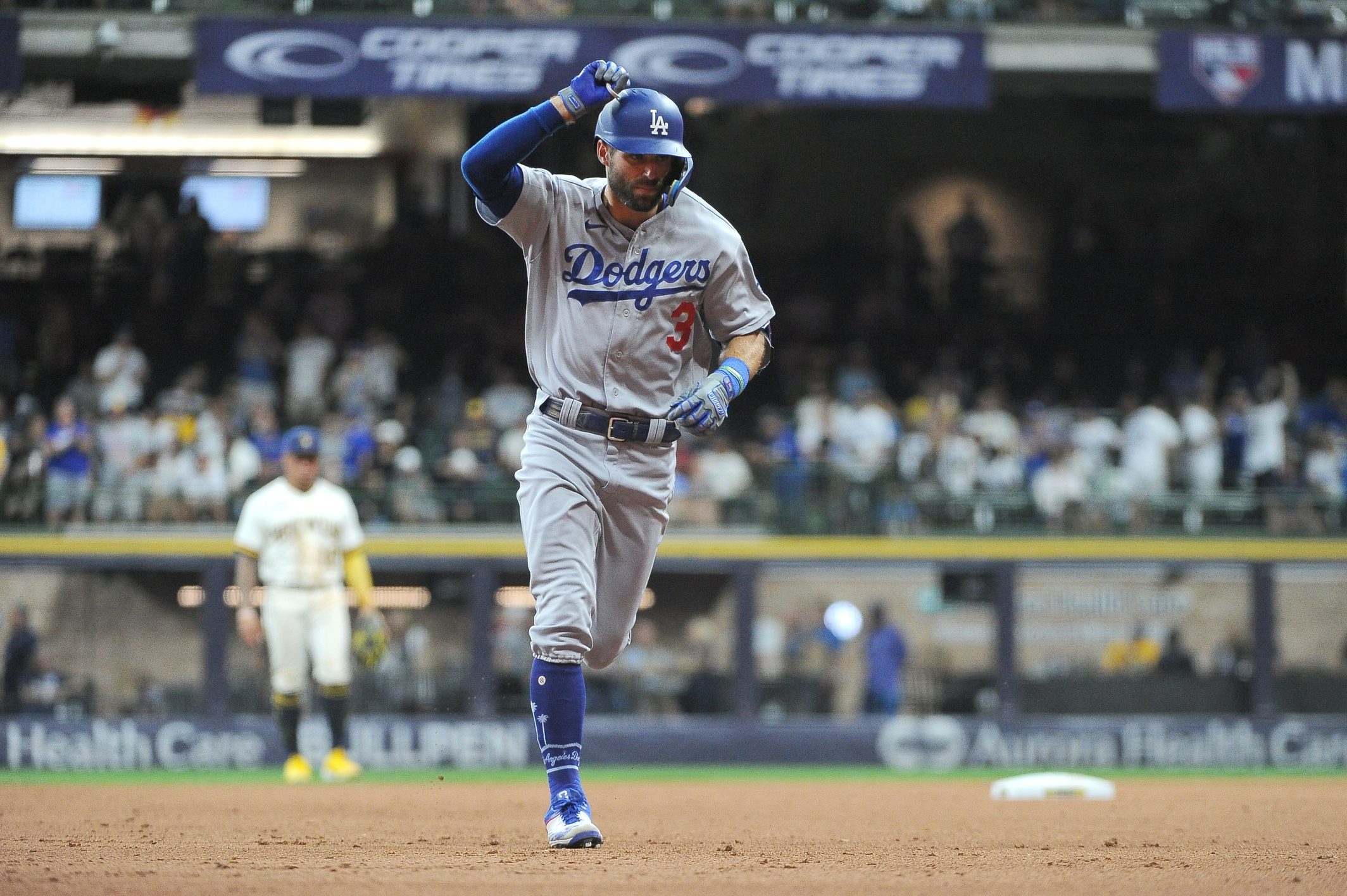 Milwaukee Brewers left fielder Andrew McCutchen catches for an out