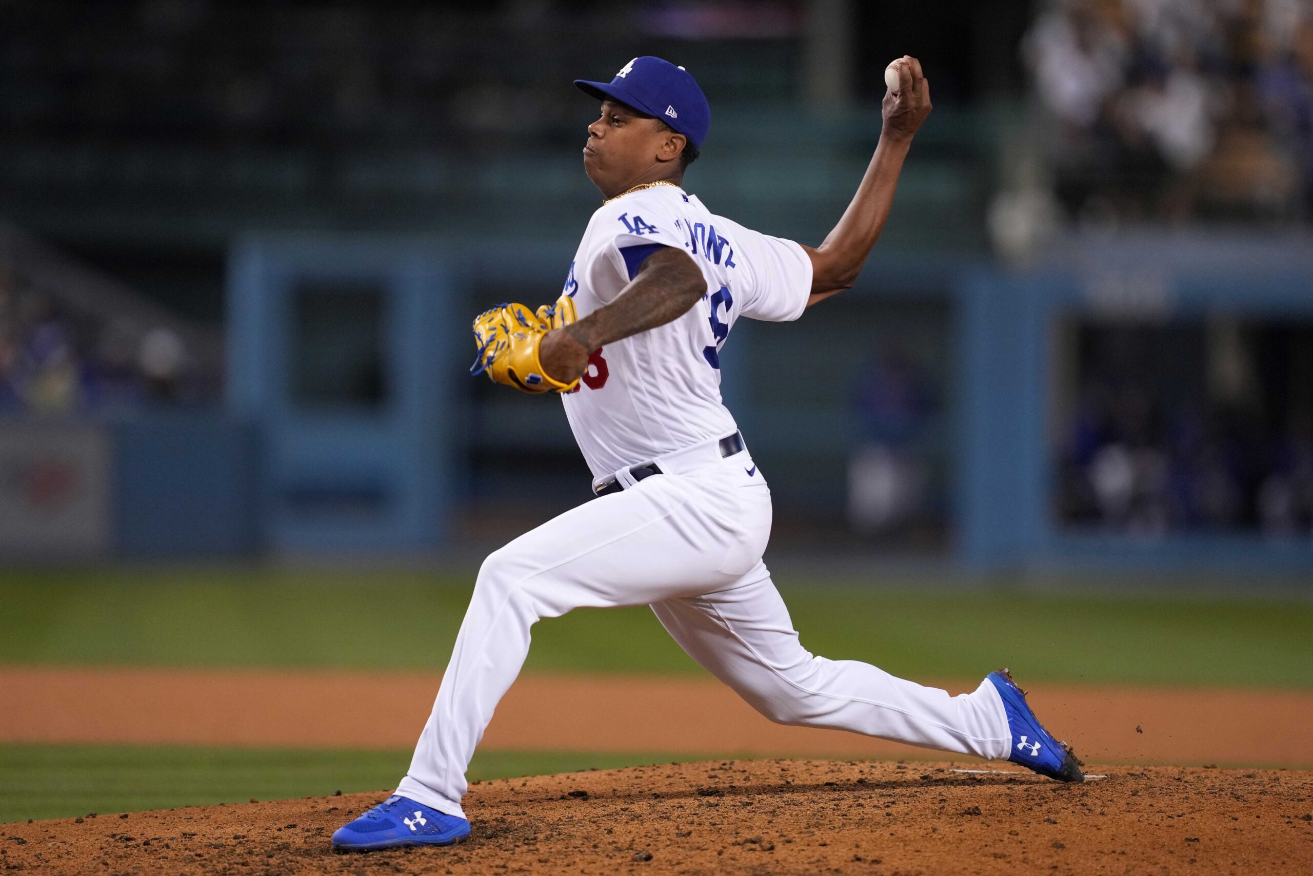 Los Angeles Dodgers relief pitcher Yency Almonte delivers during the  seventh inning of the team's baseball game against the Toronto Blue Jays,  Tuesday, July 25, 2023, in Los Angeles. (AP Photo/Ryan Sun