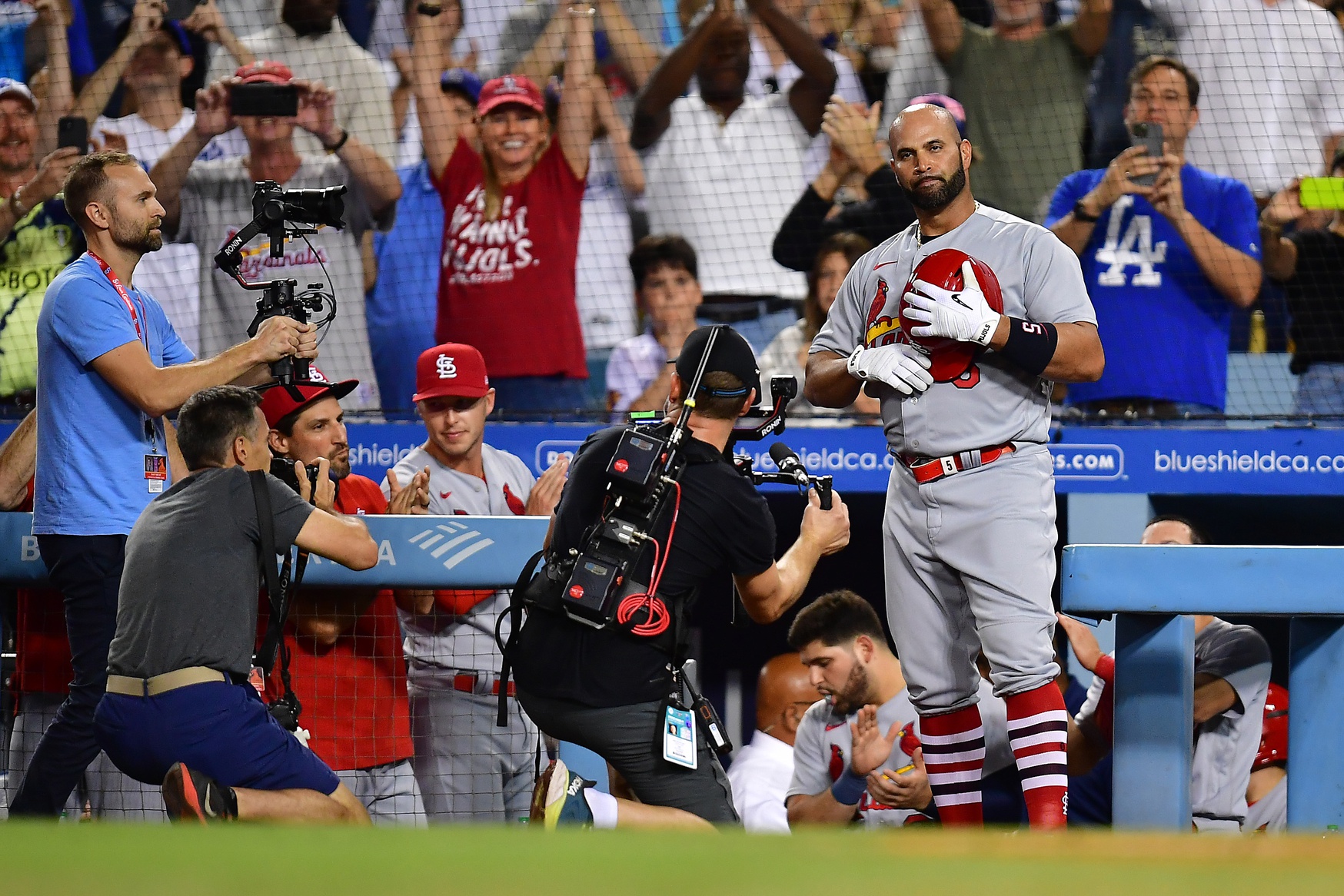 Albert Pujols hits his 700th home run, becoming the 4th player to