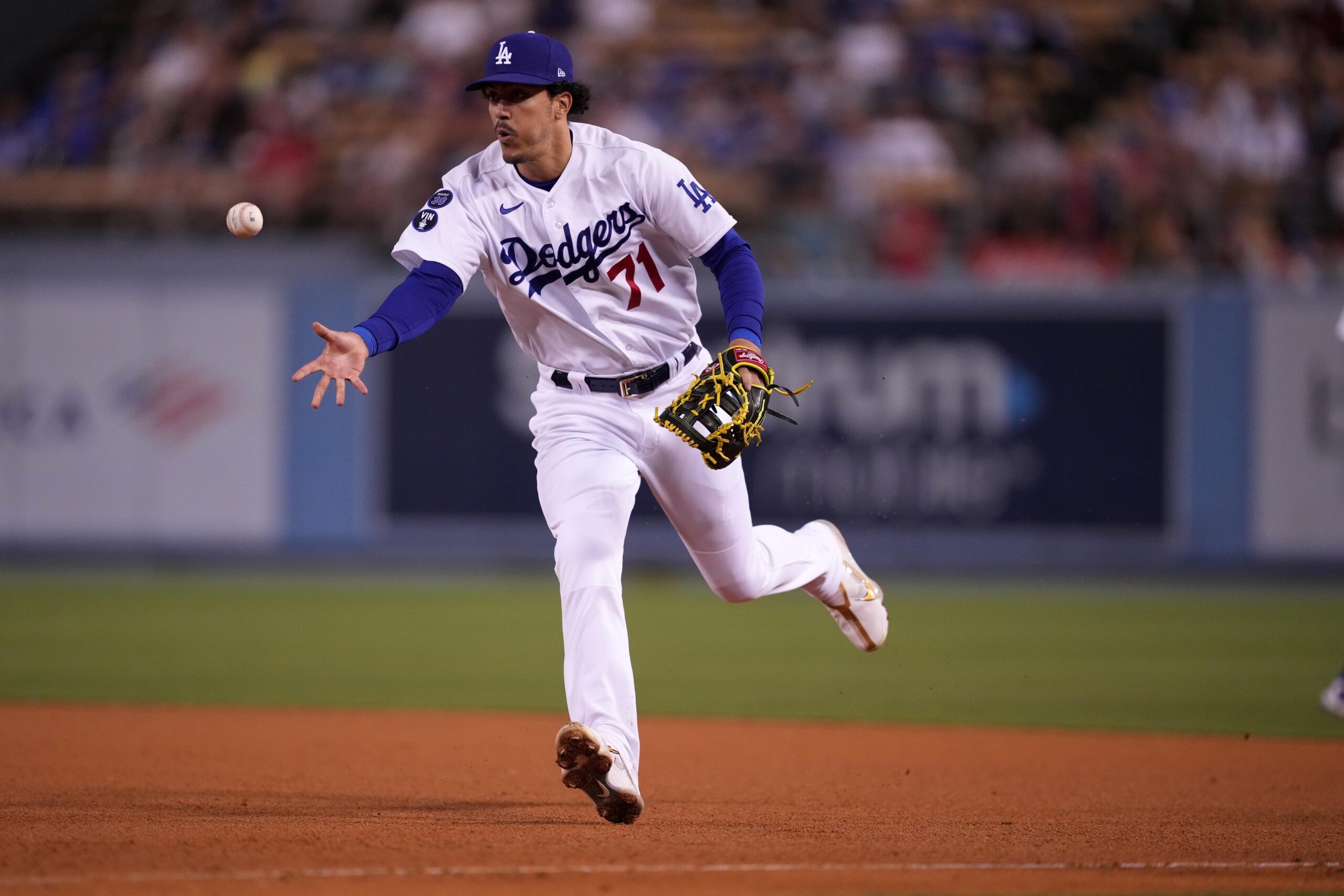 Los Angeles Dodgers second basemen Miguel Vargas (17) throws the