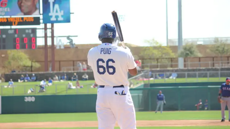 Yasiel Puig stands in the on-deck circle at Camelback Ranch in a game between the Dodgers and the Rangers. March 7, 2013.