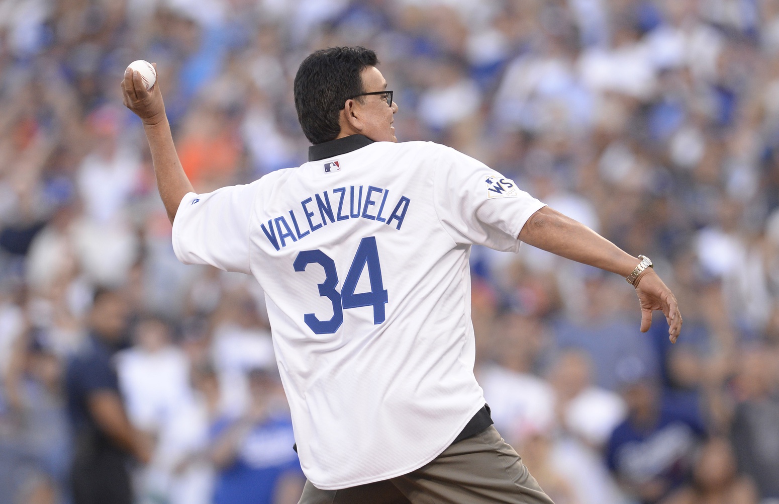 Oct 25, 2017; Los Angeles, CA, USA; Los Angeles Dodgers former pitcher Fernando Valenzuela throws out the ceremonial first pitch before game two of the 2017 World Series against the Houston Astros at Dodger Stadium. Mandatory Credit: Gary A. Vasquez-USA TODAY Sports