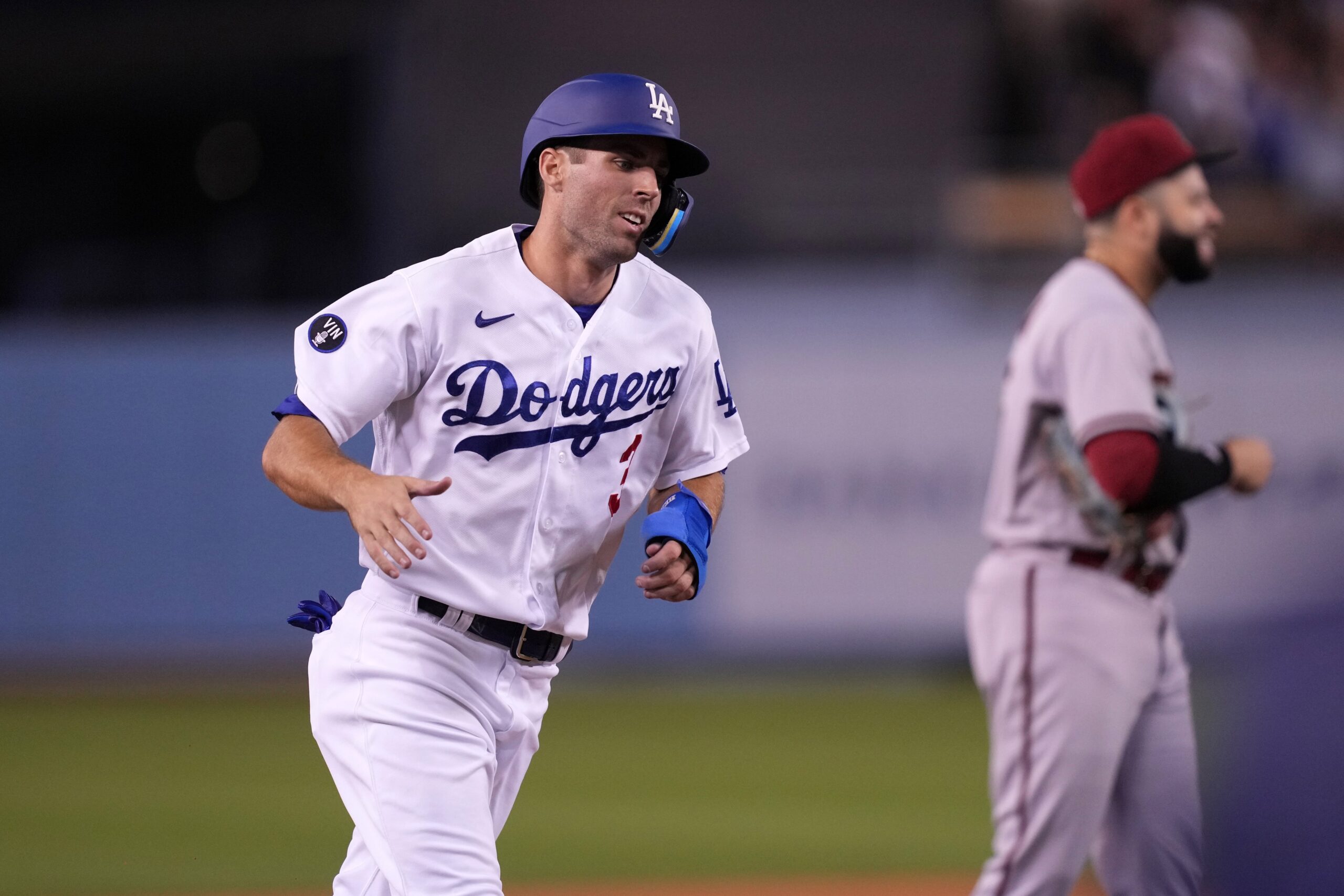 Chris Taylor of the Los Angeles Dodgers celebrates his run from a