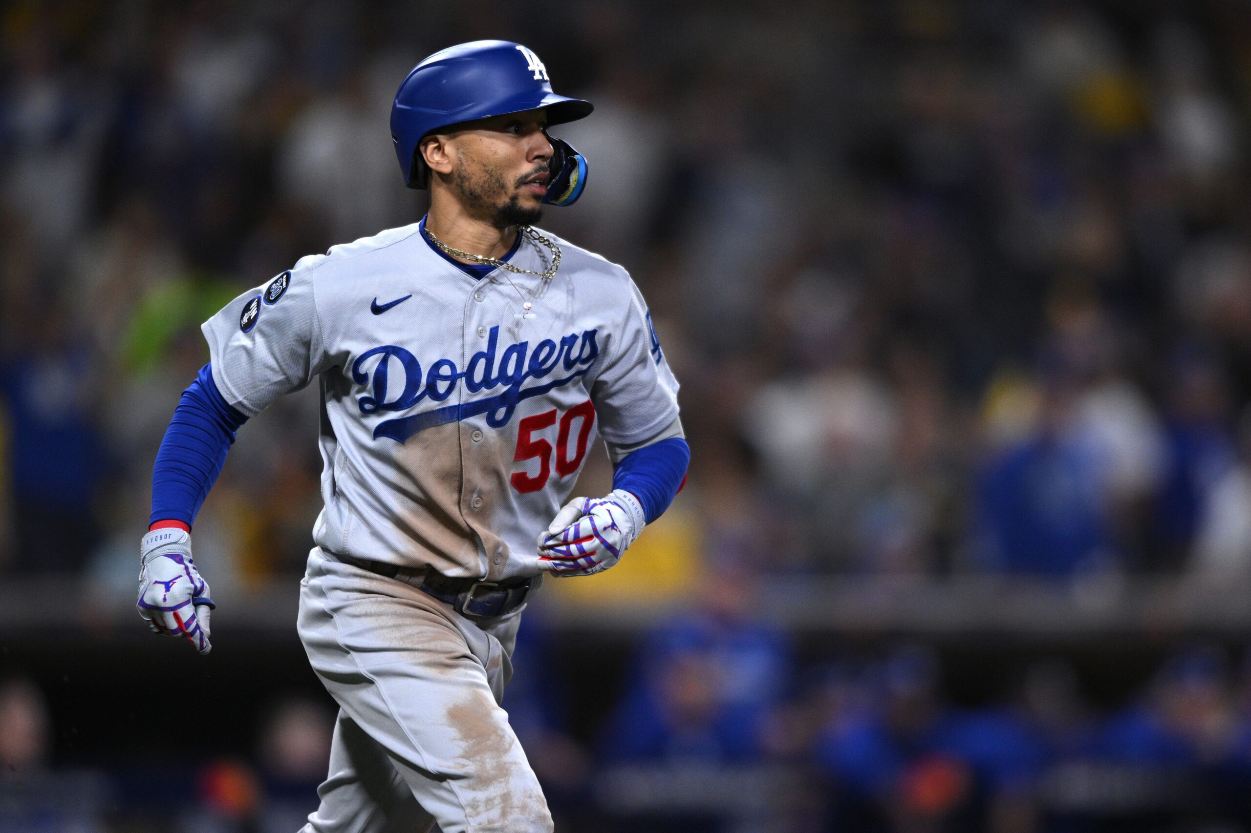 Los Angeles Dodgers' Mookie Betts celebrates a double against the Tampa Bay  Rays during the six …