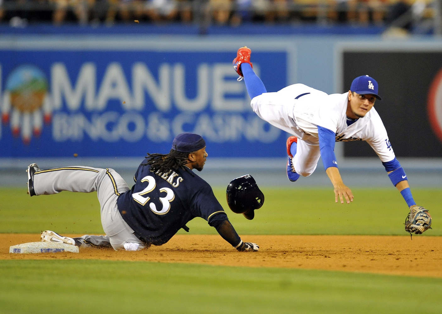 Marlins trade SS Miguel Rojas to Dodgers for prospect