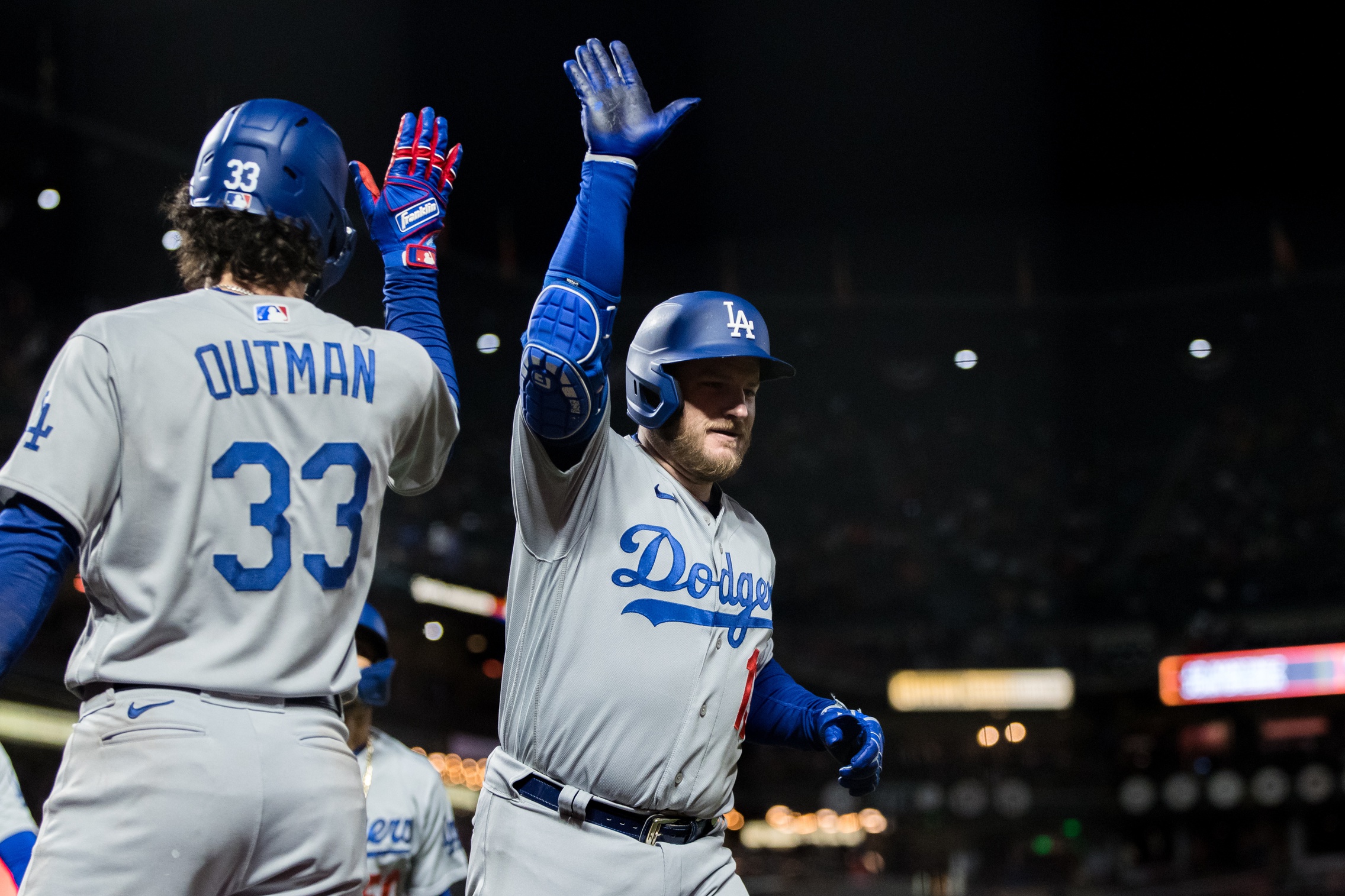 James Outman of the Los Angeles Dodgers is congratulated by Cody