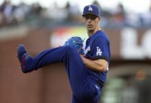 Jun 10, 2022; San Francisco, California, USA; Los Angeles Dodgers starting pitcher Walker Buehler (21) delivers a pitch against the San Francisco Giants during the second inning at Oracle Park. Mandatory Credit: D. Ross Cameron-USA TODAY Sports