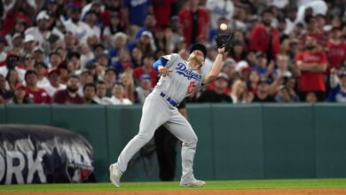 Jun 21, 2023; Anaheim, California, USA; Los Angeles Dodgers third baseman Michael Busch (83) catches a fly ball by Los Angeles Angels starting pitcher Shohei Ohtani (not pictured) in the sixth inning at Angel Stadium.