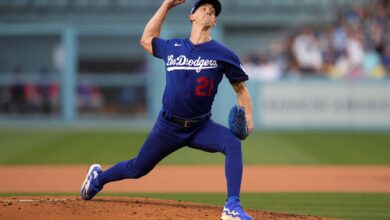 Jun 4, 2022; Los Angeles, California, USA; Los Angeles Dodgers starting pitcher Walker Buehler (21) delivers against the New York Mets in the second inning at Dodger Stadium.