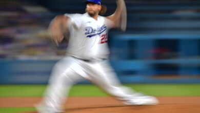 Sep 23, 2023; Los Angeles, California, USA; Los Angeles Dodgers starting pitcher Clayton Kershaw (22) throws against the San Francisco Giants during the fourth inning at Dodger Stadium.