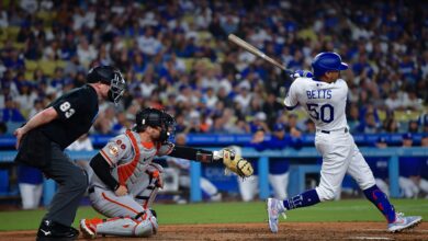 Sep 23, 2023; Los Angeles, California, USA; Los Angeles Dodgers second baseman Mookie Betts (50) hits a two run RBI double against the San Francisco Giants during the eighth inning at Dodger Stadium.