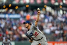 Sep 30, 2023; San Francisco, California, USA; Los Angeles Dodgers starting pitcher Clayton Kershaw (22) deliver a pitch against the San Francisco Giants during the first inning at Oracle Park.