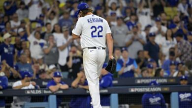 Oct 7, 2023; Los Angeles, California, USA; Los Angeles Dodgers starting pitcher Clayton Kershaw (22) reacts after giving up six runs in the first inning for game one of the NLDS against the Arizona Diamondbacks for the 2023 MLB playoffs at Dodger Stadium.