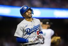Oct 11, 2023; Phoenix, Arizona, USA; Los Angeles Dodgers outfielder Mookie Betts reacts against the Arizona Diamondbacks during game three of the NLDS for the 2023 MLB playoffs at Chase Field.