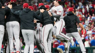 Arizona Diamondbacks left fielder Corbin Carroll (7) celebrates with teammates after defeating the Philadelphia Phillies in game seven of the NLCS at Citizens Bank Park in Philadelphia on Oct. 24, 2023.