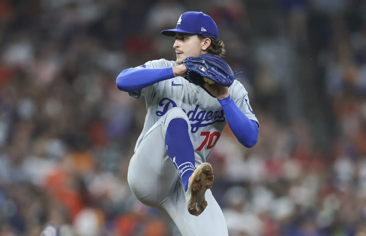 Dodgers rely on rookie pitcher in series opener against Cardinals