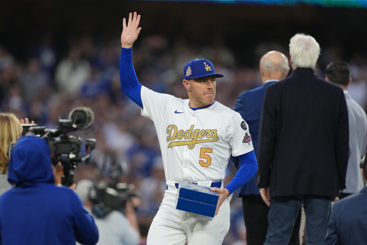 Mar 28, 2025; Los Angeles, California, USA; Los Angeles Dodgers first baseman Freddie Freeman (5) during the ring ceremony prior to the game against the Detroit Tigers at Dodger Stadium. Mandatory Credit: Kirby Lee-Imagn Images