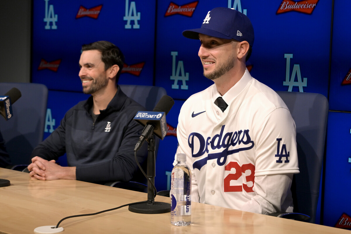 Jan 21, 2026; Los Angeles, CA, USA; Los Angeles Dodgers general manager Brandon Gomes with newly signed right fielder Kyle Tucker (23) during a press conference at Dodger Stadium. Mandatory Credit: Jayne Kamin-Oncea-Imagn Images
