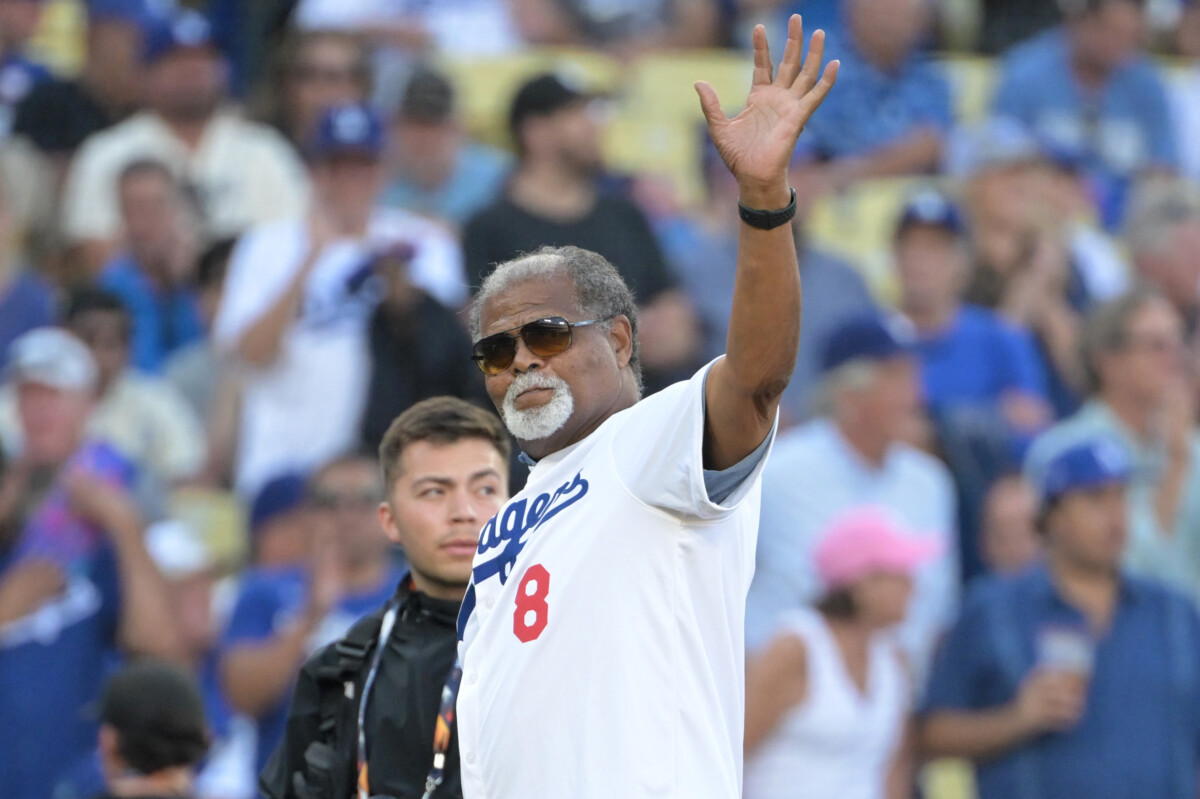 Los Angeles Dodgers legend Reggie Smith throwing the ceremonial first pitch during the 2024 postseason.