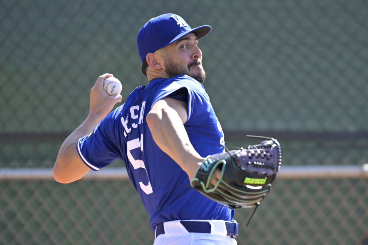 Feb 18, 2025; Glendale, AZ, USA; Los Angeles Dodgers relief pitcher Alex Vesia (51) throws in the bullpen during spring training workouts at Camelback Ranch. Mandatory Credit: Jayne Kamin-Oncea-Imagn Images