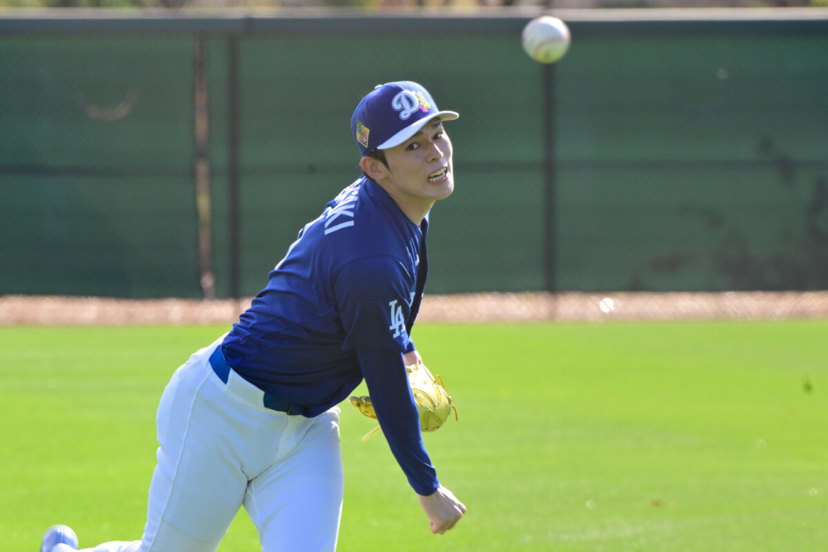 Feb 17, 2026; Glendale, AZ, USA; Los Angeles Dodgers pitcher Roki Sasaki (11) throws during a Spring Training workout at Camelback Ranch. Mandatory Credit: Matt Kartozian-Imagn Images