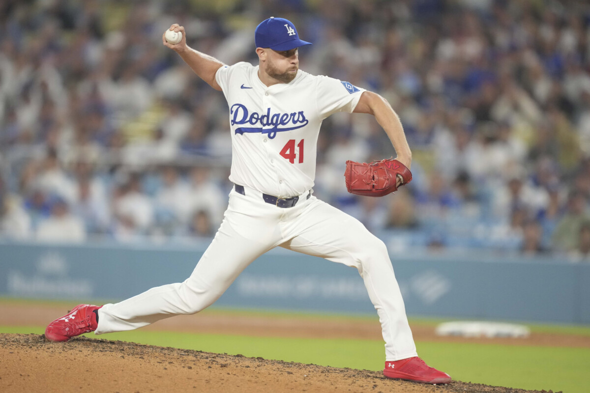 Los Angeles Dodgers pitcher Brock Stewart (41) delivers a pitch in the top of the ninth inning during an MLB game against the St. Louis Cardinals at Dodger Stadium.