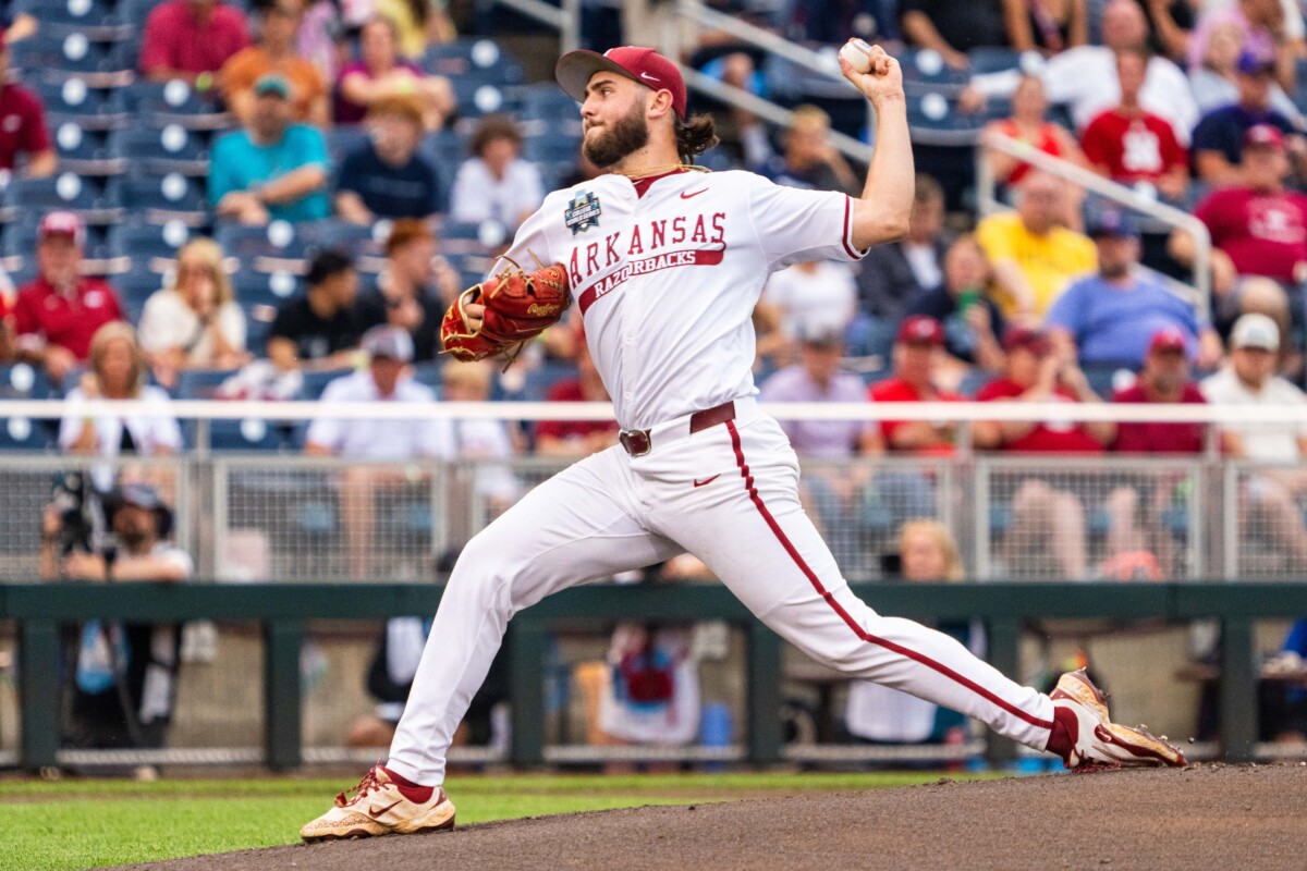 Arkansas Razorbacks starting pitcher Zach Root (33) pitches against the UCLA Bruins during the first inning at Charles Schwab Field.