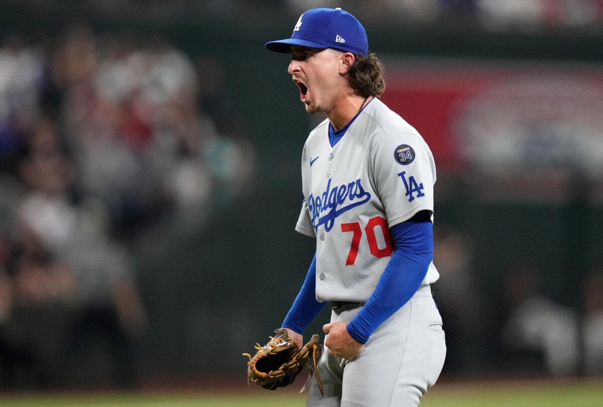 Los Angeles Dodgers left-hander Justin Wrobleski (70) yells out after striking out Arizona Diamondbacks hitter Alek Thomas (5) to win the game 5-4 in extra innings at Chase Field in Phoenix, on Sept. 24, 2025.
