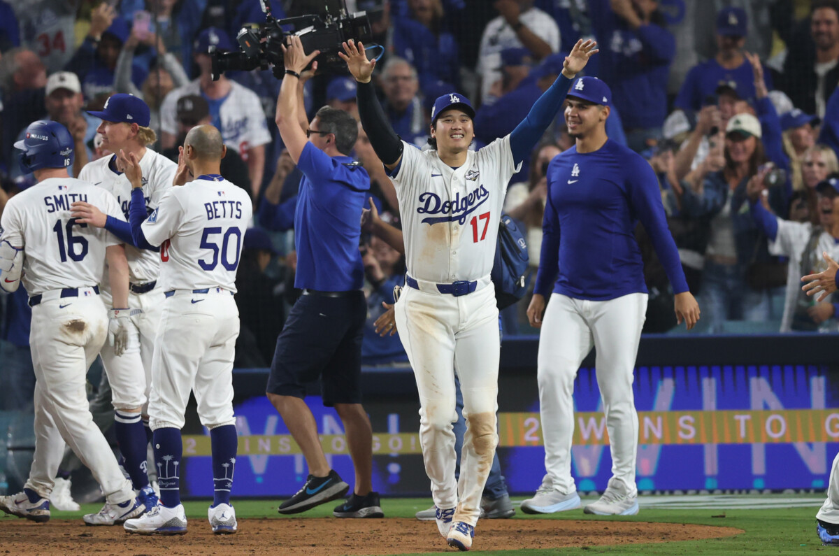 Los Angeles Dodgers designated hitter Shohei Ohtani (17) celebrates after winning in the eighteenth inning against the Toronto Blue Jays in game three of the 2025 MLB World Series at Dodger Stadium.
