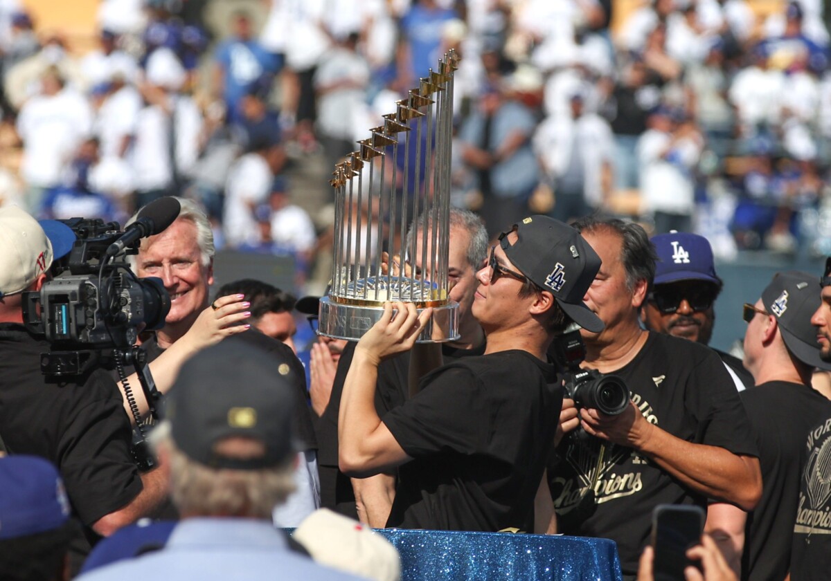 Joe Lumaya/Special to the Star 2025 World Series MVP Yoshinobu Yamamoto holds up the 2025 World Series Championship trophy durng the celebration that was held at Dodger Stadium on Monday November 3, 2025. Dodgers beat the Toronto Blue Jays in a thrilling game 7 that was played in Toronto Canada to take the Championship. 11-3-2025 Los Angeles, CA
