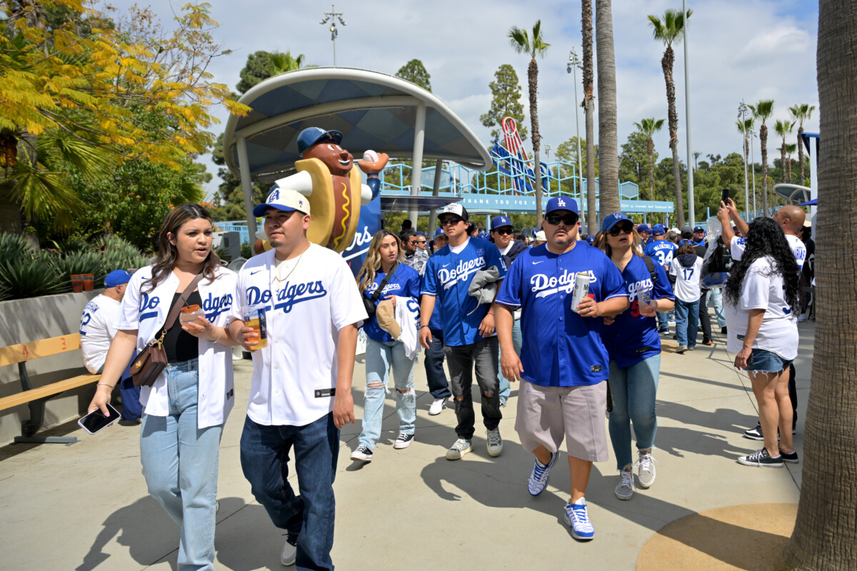 Mar 27, 2025; Los Angeles, California, USA; Fans enjoy food and sunshine prior to the game between the Los Angeles Dodgers and the Detroit Tigers at Dodger Stadium. Mandatory Credit: Jayne Kamin-Oncea-Imagn Images