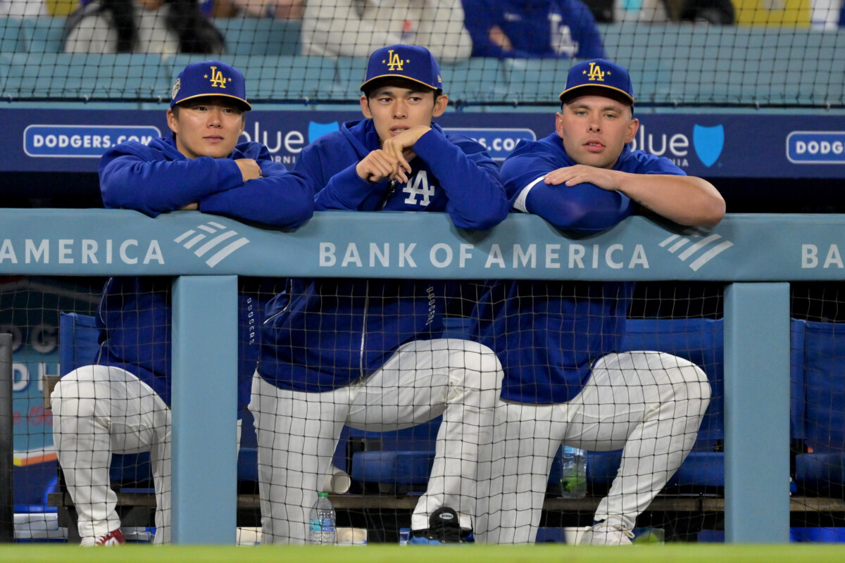 Mar 28, 2026; Los Angeles, California, USA; Los Angeles Dodgers pitcher Yoshinobu Yamamoto (18), pitcher Roki Sasaki (11) and catcher Dalton Rushing (68) during the ninth inning against the Arizona Diamondbacks at Dodger Stadium. Mandatory Credit: Jayne Kamin-Oncea-Imagn Images