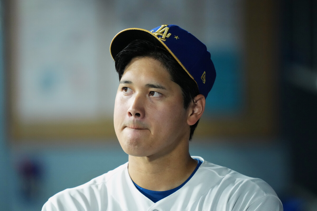 Mar 26, 2026; Los Angeles, California, USA; Los Angeles Dodgers designated hitter Shohei Ohtani (17) reacts in the dugout during the ninth inning against the Arizona Diamondbacks at Dodger Stadium. Mandatory Credit: Kirby Lee-Imagn Images