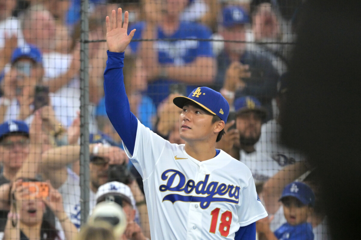 Mar 27, 2026; Los Angeles, California, USA; Los Angeles Dodgers pitcher Yoshinobu Yamamoto (18) acknowledges fans during the World Series ring ceremony before the game against the Arizona Diamondbacks at Dodger Stadium. Mandatory Credit: Jayne Kamin-Oncea-Imagn Images
