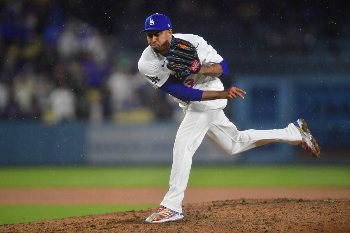 Mar 31, 2026; Los Angeles, California, USA; Los Angeles Dodgers pitcher Edwin Diaz (3) throws against the Cleveland Guardians during the ninth inning at Dodger Stadium. Mandatory Credit: Gary A. Vasquez-Imagn Images