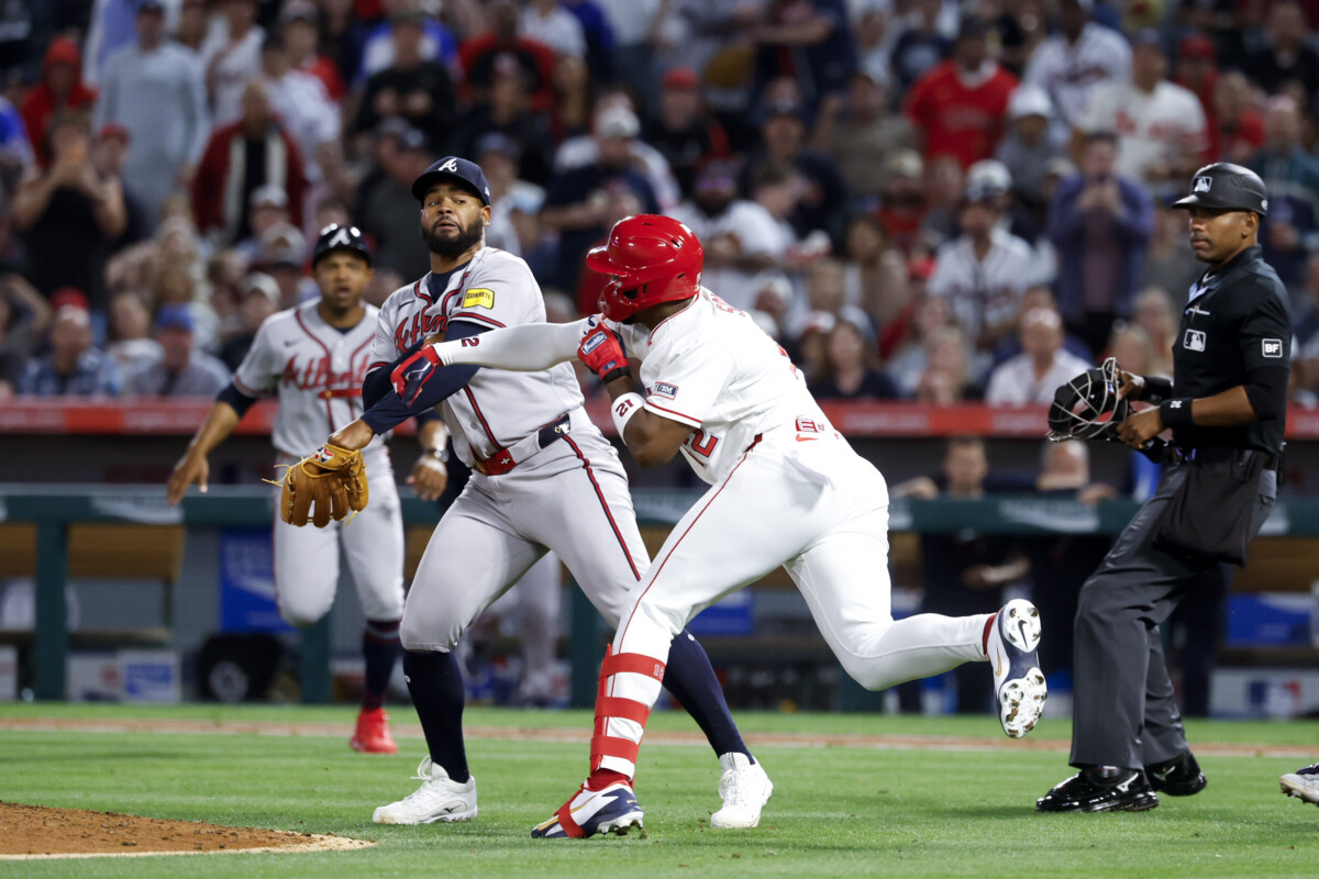 Apr 7, 2026; Anaheim, California, USA; A fight breaks out between Atlanta Braves pitcher Reynaldo López (40) and Los Angeles Angels right fielder Jorge Soler (12) during the fifth inning at Angel Stadium. Mandatory Credit: William Navarro-Imagn Images