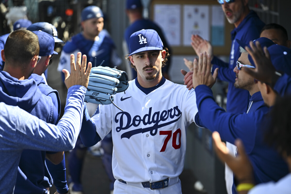 Apr 26, 2026; Los Angeles, California, USA; Los Angeles Dodgers pitcher Justin Wrobleski (70) celebrates in the dugout after the sixth inning against the Chicago Cubs at Dodger Stadium. Mandatory Credit: Jonathan Hui-Imagn Images