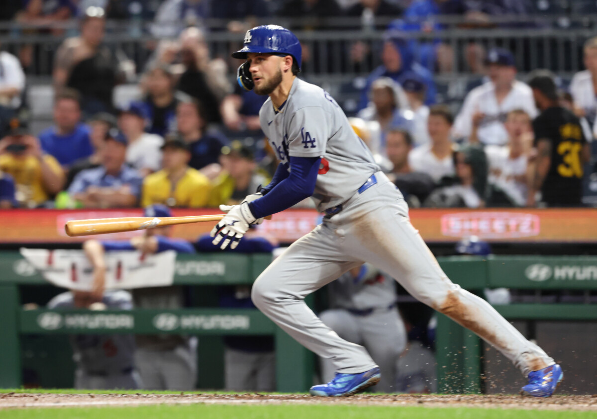 Jun 9, 2026; Pittsburgh, Pennsylvania, USA; Los Angeles Dodgers second baseman Alex Freeland (76) hits a single against the Pittsburgh Pirates during the seventh inning at PNC Park. Mandatory Credit: Charles LeClaire-Imagn Images