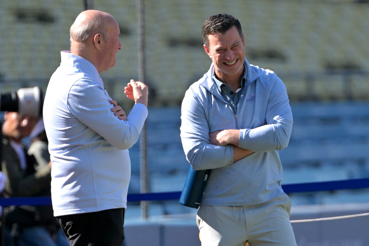 Apr 28, 2026; Los Angeles, California, USA; Los Angeles Dodgers President and CEO Stan Kasten talks with Andrew Friedman, President of Baseball Operations, prior to the game against the Miami Marlins at Dodger Stadium. Mandatory Credit: Jayne Kamin-Oncea-Imagn Images
