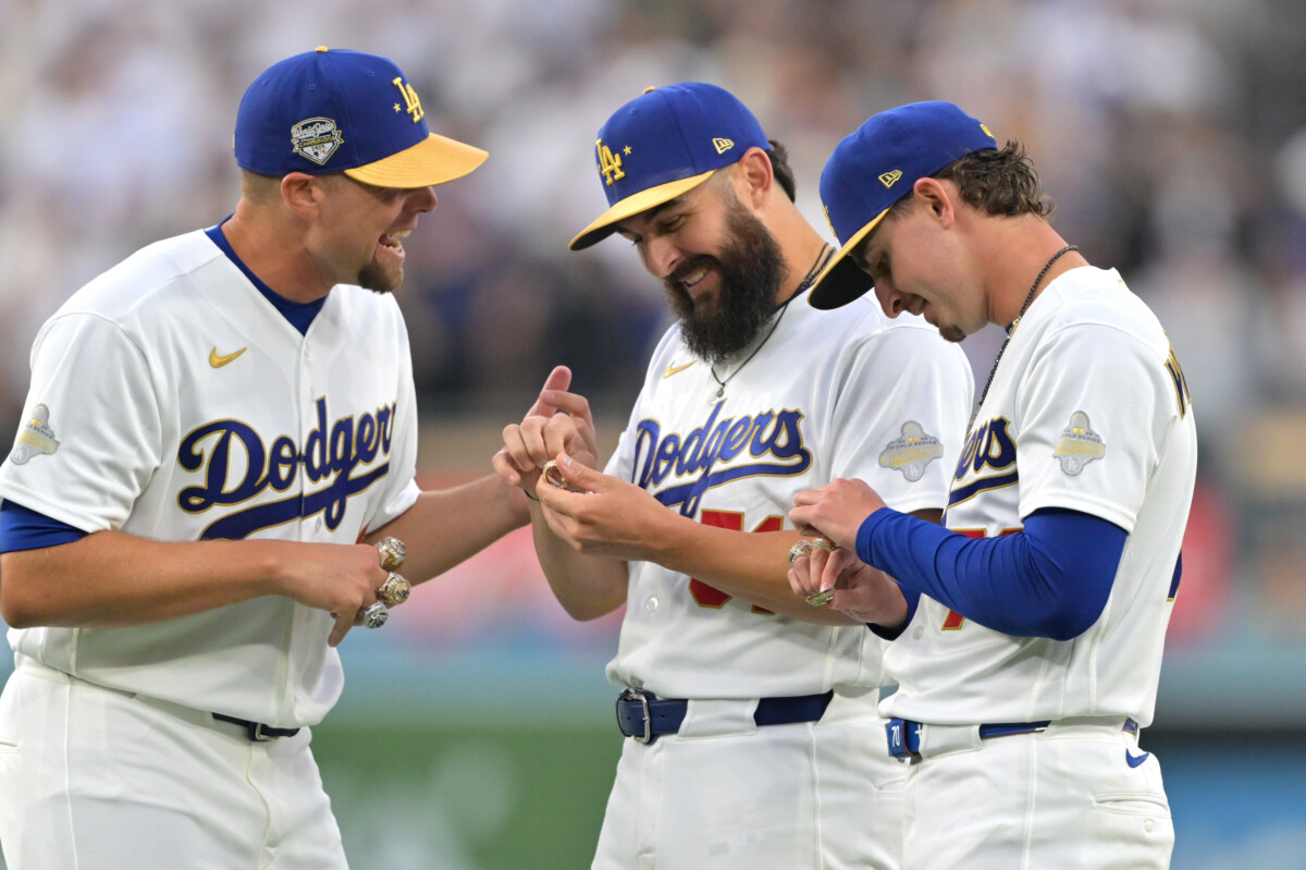 Mar 27, 2026; Los Angeles, California, USA; Los Angeles Dodgers pitcher Blake Treinen (49) and pitcher Alex Vesia (51) and pitcher Justin Wrobleski (70) during the World Series ring ceremony before the game against the Arizona Diamondbacks at Dodger Stadium. Mandatory Credit: Jayne Kamin-Oncea-Imagn Images