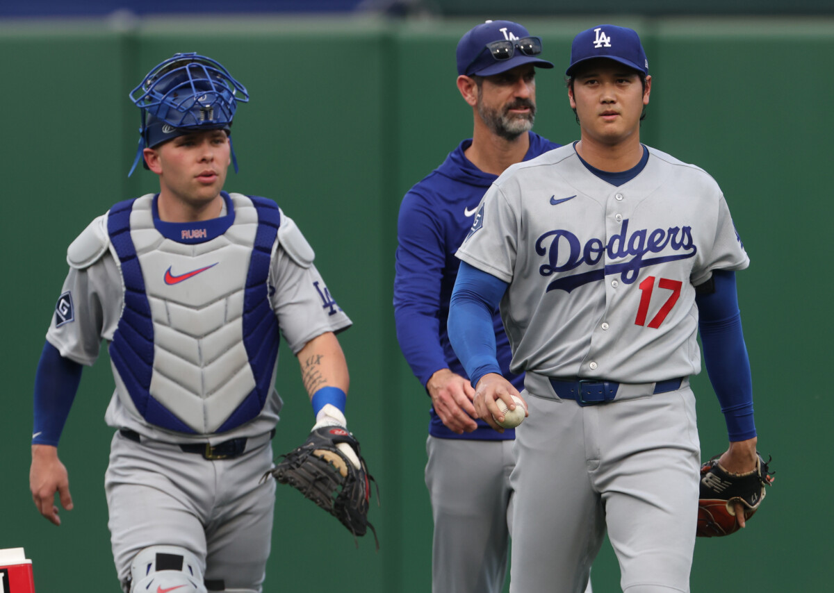Jun 10, 2026; Pittsburgh, Pennsylvania, USA; Los Angeles Dodgers catcher Dalton Rushing (68) and two-way player Shohei Ohtani (17) make thier way in from the bullpen to play the Pittsburgh Pirates at PNC Park. Mandatory Credit: Charles LeClaire-Imagn Images
